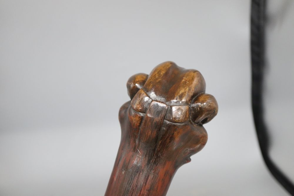 A kneeling man knobkerrie, with bone mounted handle, length 60cm